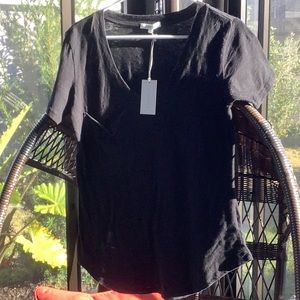 NWT black tee with pocket. Size small..short sleeves